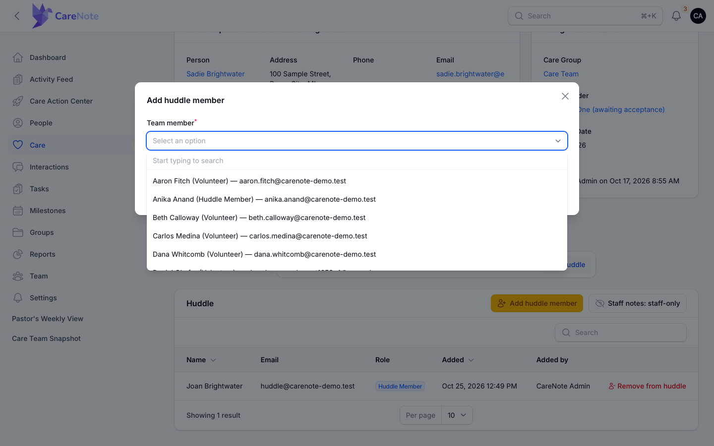 The Team member dropdown listing eligible Volunteers and Huddle Members